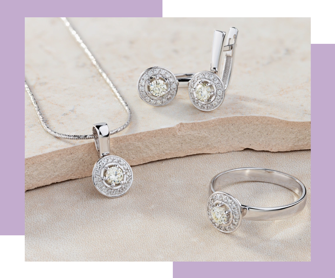 Group 1321317502 A set of jewelry that includes earrings, necklace and ring.